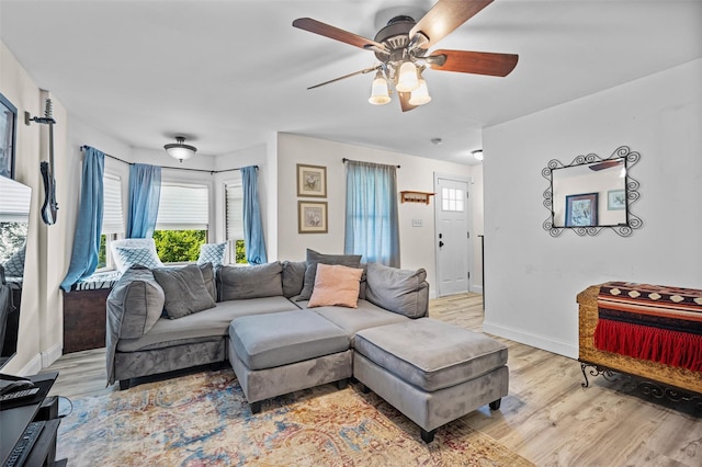 68 Silver Spring Rd, New Windsor, NY 12553 - living area with light wood-style floors and ceiling fan