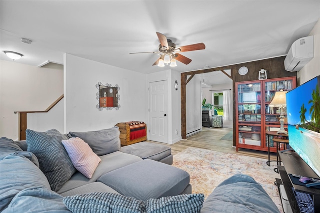 68 Silver Spring Rd, New Windsor, NY 12553 - living area featuring a wall unit AC, wood finished floors, and a ceiling fan