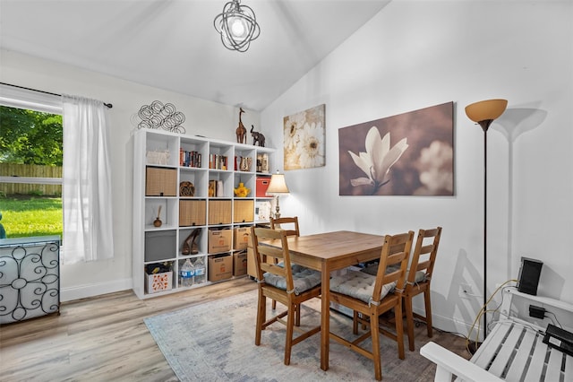68 Silver Spring Rd, New Windsor, NY 12553 - dining room featuring vaulted ceiling and light wood-style flooring