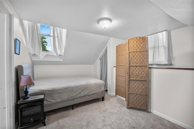 68 Silver Spring Rd, New Windsor, NY 12553 - carpeted bedroom featuring vaulted ceiling and baseboards