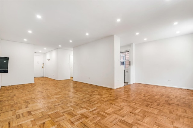 151-15 84th St Unit 1F, Howard Beach, NY 11414 - unfurnished room with baseboards and recessed lighting
