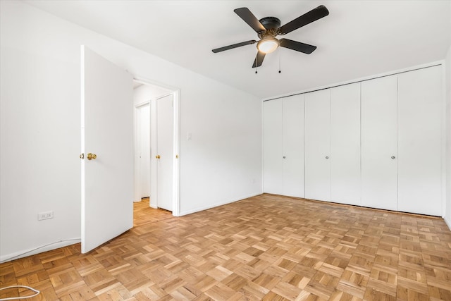 151-15 84th St Unit 1F, Howard Beach, NY 11414 - unfurnished bedroom featuring baseboards, ceiling fan, and a closet