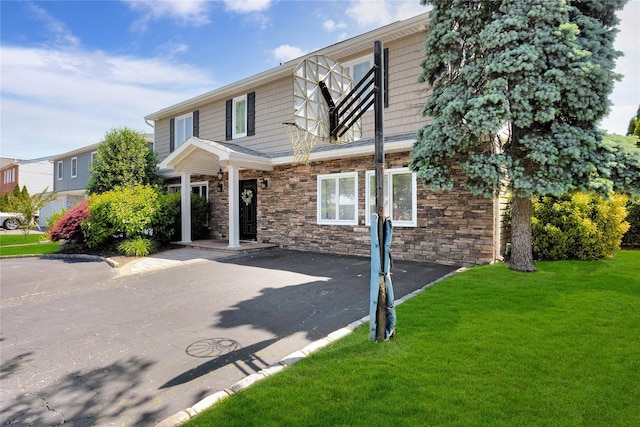 2985 Cheryl Rd, Merrick, NY 11566 - townhome / multi-family property with a front lawn and stone siding