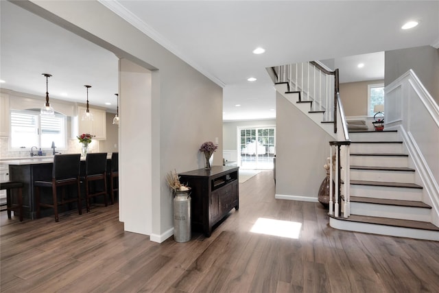 2985 Cheryl Rd, Merrick, NY 11566 - staircase with wood finished floors, recessed lighting, baseboards, and ornamental molding
