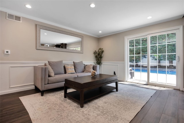 2985 Cheryl Rd, Merrick, NY 11566 - living room featuring wood finished floors, crown molding, a wainscoted wall, and recessed lighting