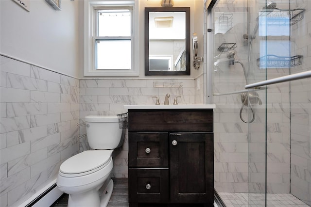 2985 Cheryl Rd, Merrick, NY 11566 - bathroom with a baseboard radiator, vanity, tile walls, toilet, and a stall shower