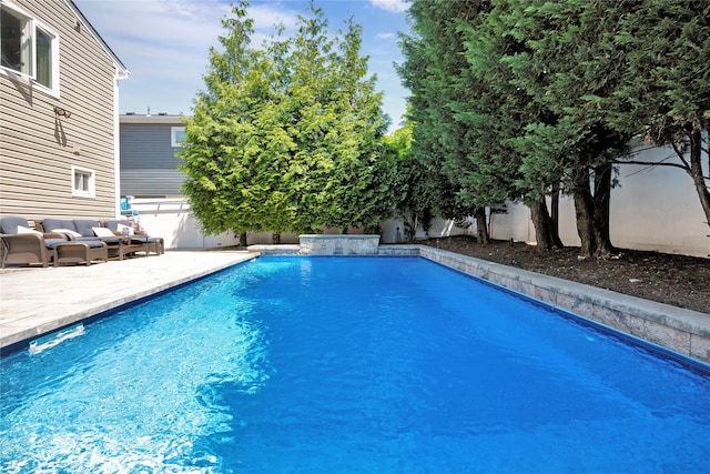 2985 Cheryl Rd, Merrick, NY 11566 - view of swimming pool featuring a fenced backyard and a patio