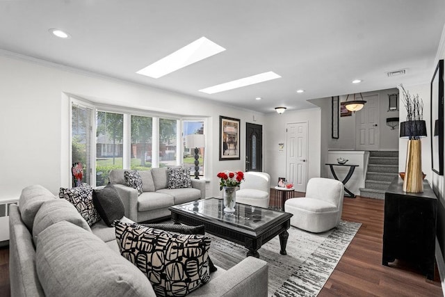 18 Birchwood Park Dr, Syosset, NY 11791 - living room with crown molding, a skylight, wood finished floors, recessed lighting, and stairway