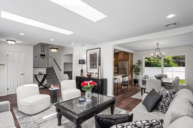 18 Birchwood Park Dr, Syosset, NY 11791 - living room featuring dark wood finished floors, a chandelier, crown molding, stairs, and recessed lighting