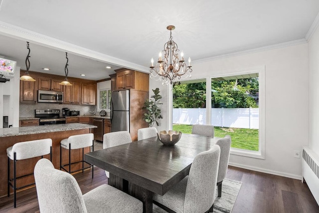 18 Birchwood Park Dr, Syosset, NY 11791 - dining area featuring a chandelier, radiator, dark wood-style floors, recessed lighting, and ornamental molding