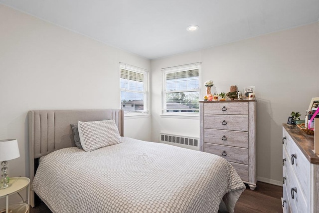 18 Birchwood Park Dr, Syosset, NY 11791 - bedroom with radiator, dark wood-style floors, recessed lighting, and baseboards