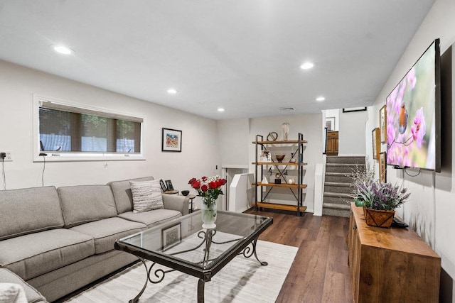 18 Birchwood Park Dr, Syosset, NY 11791 - living area with dark wood-style flooring, recessed lighting, and stairway