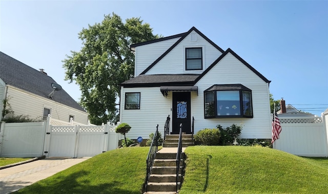 166-34 21st Ave, Whitestone, NY 11357 - view of front of house with a gate, a shingled roof, and entry steps