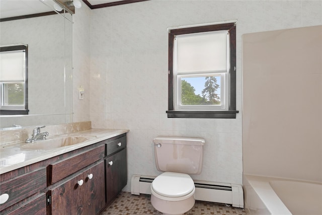 1295 Washington Ave, Greenport, NY 11944 - bathroom featuring baseboard heating, vanity, ornamental molding, toilet, and a bathtub
