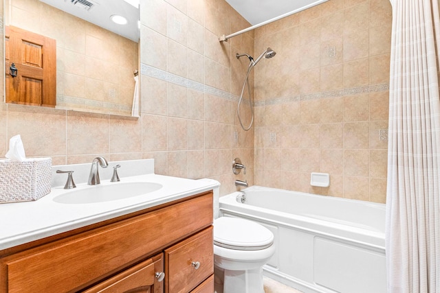2A Suffern Ln, Garnerville, NY 10923 - bathroom featuring shower / tub combo, toilet, vanity, and tile walls