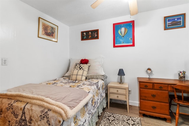 200 Diplomat Dr Unit 3D, Mount Kisco, NY 10549 - bedroom featuring wood finished floors, a desk, baseboards, and ceiling fan