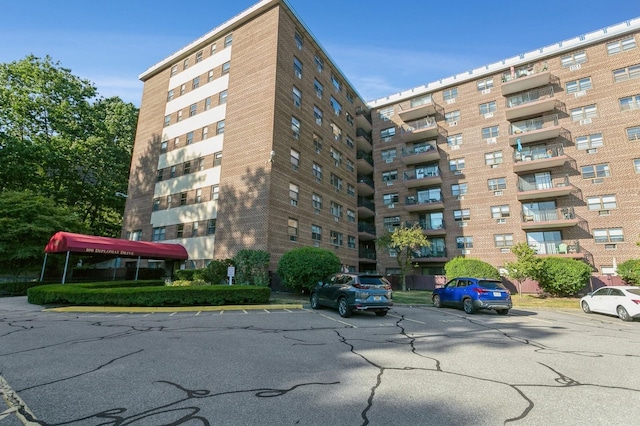 200 Diplomat Dr Unit 3D, Mount Kisco, NY 10549 - view of apartment building / complex with uncovered parking