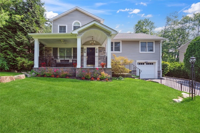 4 Valley Rd, Syosset, NY 11791 - view of front of property with a garage, covered porch, a front yard, and stone siding
