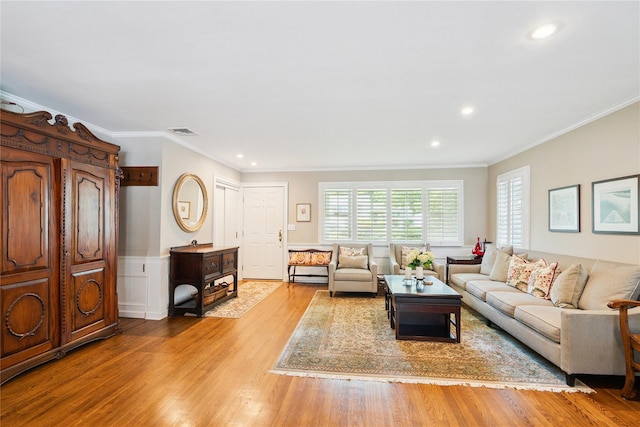 4 Valley Rd, Syosset, NY 11791 - living room with wood finished floors, crown molding, and recessed lighting