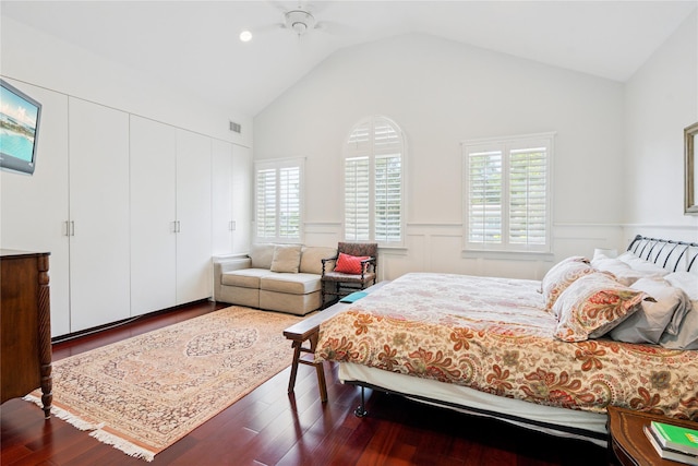 4 Valley Rd, Syosset, NY 11791 - bedroom featuring multiple windows, a wainscoted wall, wood finished floors, lofted ceiling, and a closet