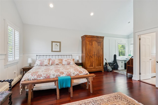 4 Valley Rd, Syosset, NY 11791 - bedroom with vaulted ceiling, dark wood-type flooring, a wainscoted wall, recessed lighting, and a decorative wall