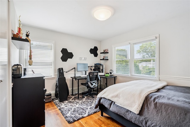 4 Valley Rd, Syosset, NY 11791 - bedroom featuring light wood-style floors and a desk