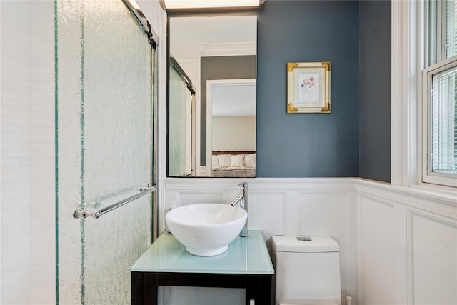 4 Valley Rd, Syosset, NY 11791 - full bathroom with a decorative wall, a stall shower, vanity, a wainscoted wall, and crown molding