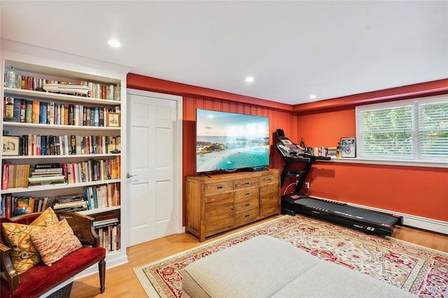 4 Valley Rd, Syosset, NY 11791 - workout area with wood finished floors and recessed lighting