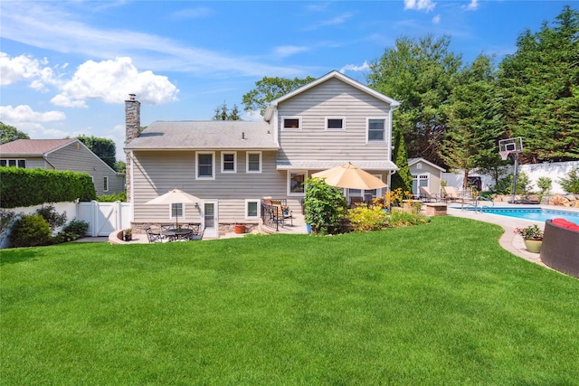 4 Valley Rd, Syosset, NY 11791 - back of property with a fenced backyard, a patio, a chimney, and a shingled roof