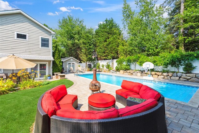 4 Valley Rd, Syosset, NY 11791 - view of swimming pool with an outbuilding, a patio area, a fenced backyard, and an outdoor living space