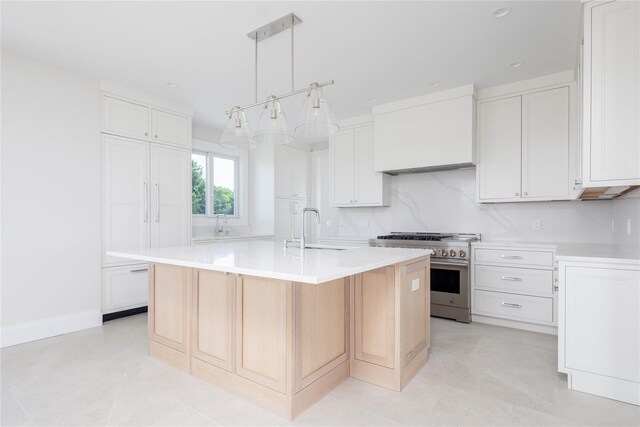 7 Convent Ln, Center Moriches, NY 11934 - kitchen featuring stainless steel range, light countertops, and white cabinets