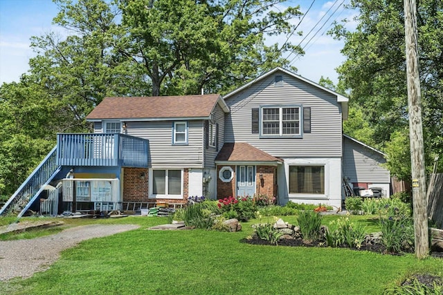 484 Rte 211 W, Middletown, NY 10940 - view of front of home featuring a front lawn, brick siding, and a shingled roof
