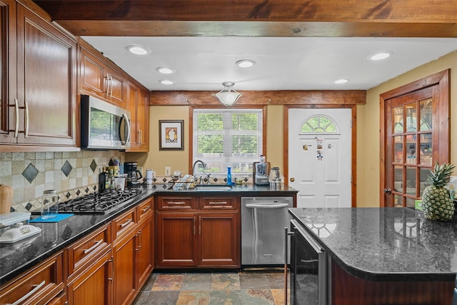 484 Rte 211 W, Middletown, NY 10940 - kitchen with stainless steel appliances, wine cooler, a sink, tasteful backsplash, and dark stone finish floors