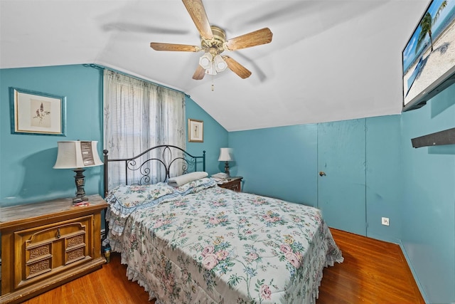 484 Rte 211 W, Middletown, NY 10940 - bedroom featuring wood finished floors, vaulted ceiling, and ceiling fan