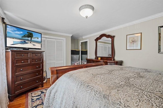 484 Rte 211 W, Middletown, NY 10940 - bedroom with wood finished floors, crown molding, and a closet