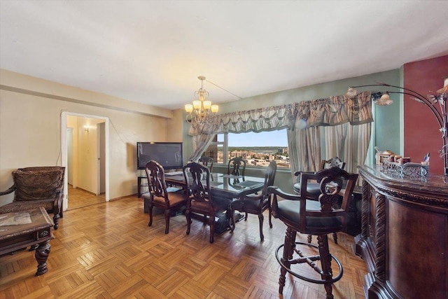 3 Fordham Hill Oval Unit 10B, Bronx, NY 10468 - dining room with a chandelier and baseboards