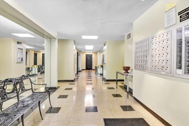 3 Fordham Hill Oval Unit 10B, Bronx, NY 10468 - corridor with baseboards, mail area, and granite floors