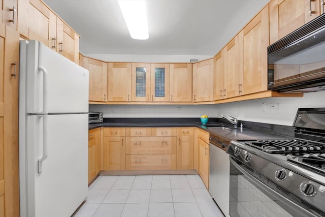 2 Bay Club Dr Unit 2B, Bayside, NY 11360 - kitchen with black appliances, light brown cabinets, dark countertops, and glass insert cabinets