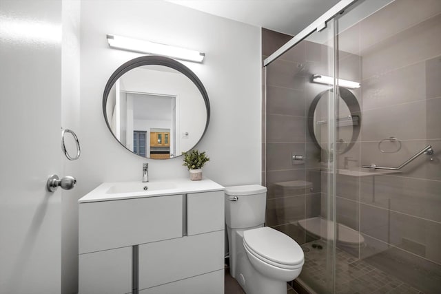 2 Bay Club Dr Unit 2B, Bayside, NY 11360 - bathroom featuring vanity, a stall shower, and toilet