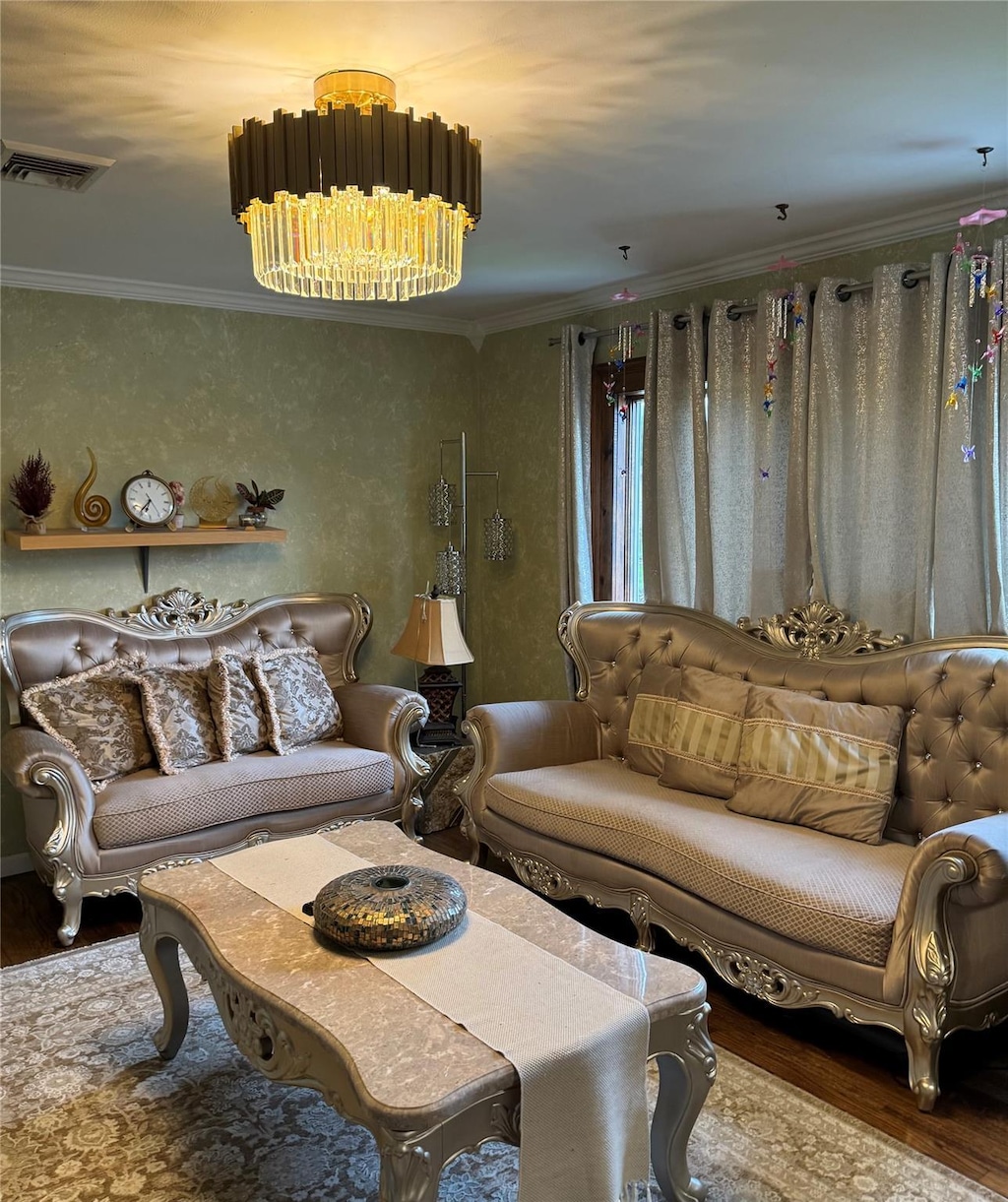 1 Winthrop St, Islip, NY 11751 - living room featuring wood finished floors and crown molding