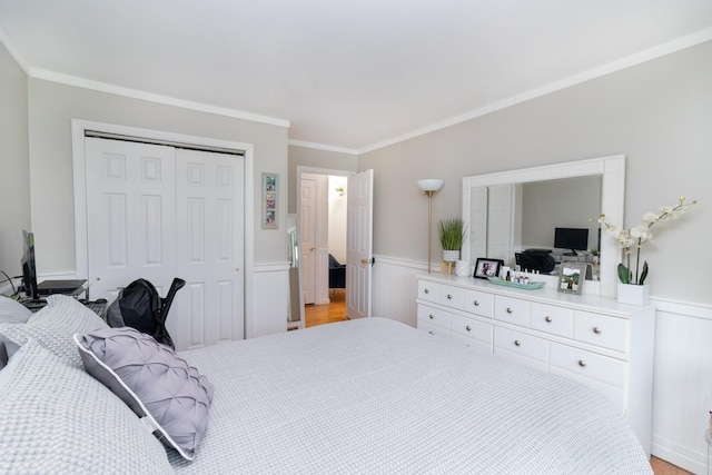2449 Union Blvd Unit 36-A, Islip, NY 11751 - bedroom featuring a wainscoted wall, a closet, and crown molding