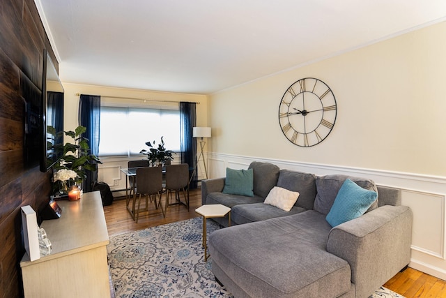2449 Union Blvd Unit 36-A, Islip, NY 11751 - living area featuring wainscoting, wood finished floors, crown molding, and baseboard heating