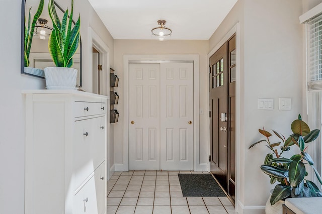 85 Fairmount St, Huntington, NY 11743 - entrance foyer featuring light tile patterned floors and baseboards