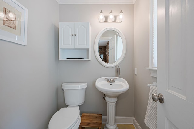 85 Fairmount St, Huntington, NY 11743 - bathroom with toilet, baseboards, and ornamental molding