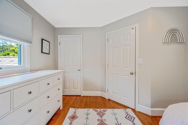 85 Fairmount St, Huntington, NY 11743 - bedroom featuring light wood-type flooring, baseboards, and crown molding