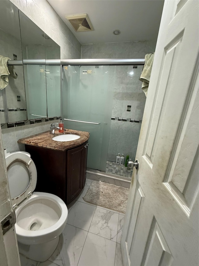 57-54 Xenia St, Corona, NY 11368 - full bathroom featuring toilet, a stall shower, vanity, and marble finish floors