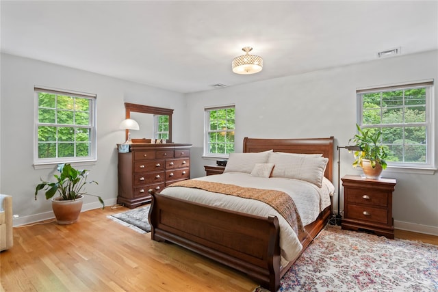 319 Thompson St, Port Jefferson, NY 11777 - bedroom featuring wood finished floors and baseboards