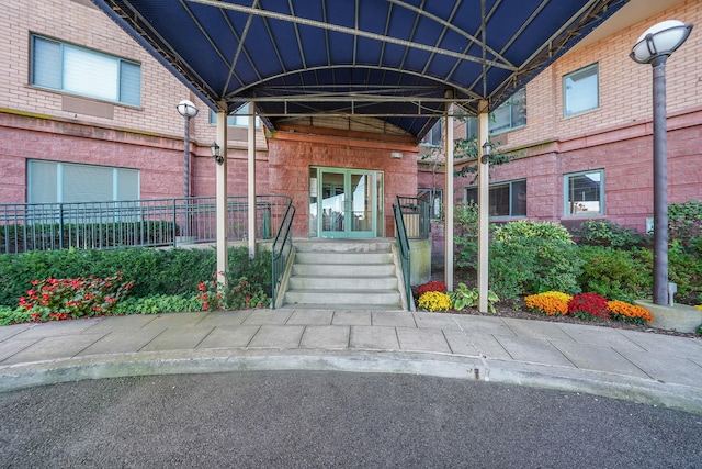 136 Bch 117th St Unit 6H, Rockaway Park, NY 11694 - view of exterior entry with brick siding