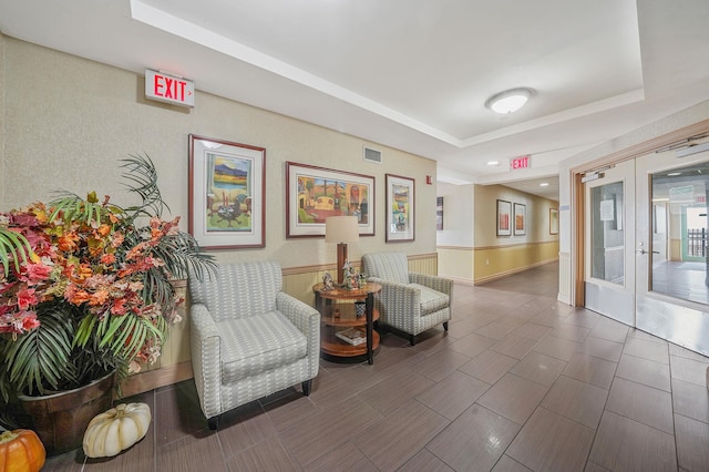 136 Bch 117th St Unit 6H, Rockaway Park, NY 11694 - building lobby featuring wainscoting and recessed lighting