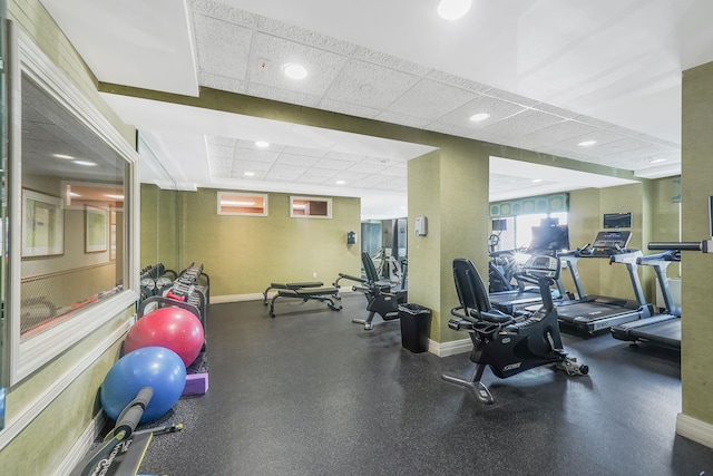 136 Bch 117th St Unit 6H, Rockaway Park, NY 11694 - exercise room featuring a paneled ceiling, baseboards, and recessed lighting